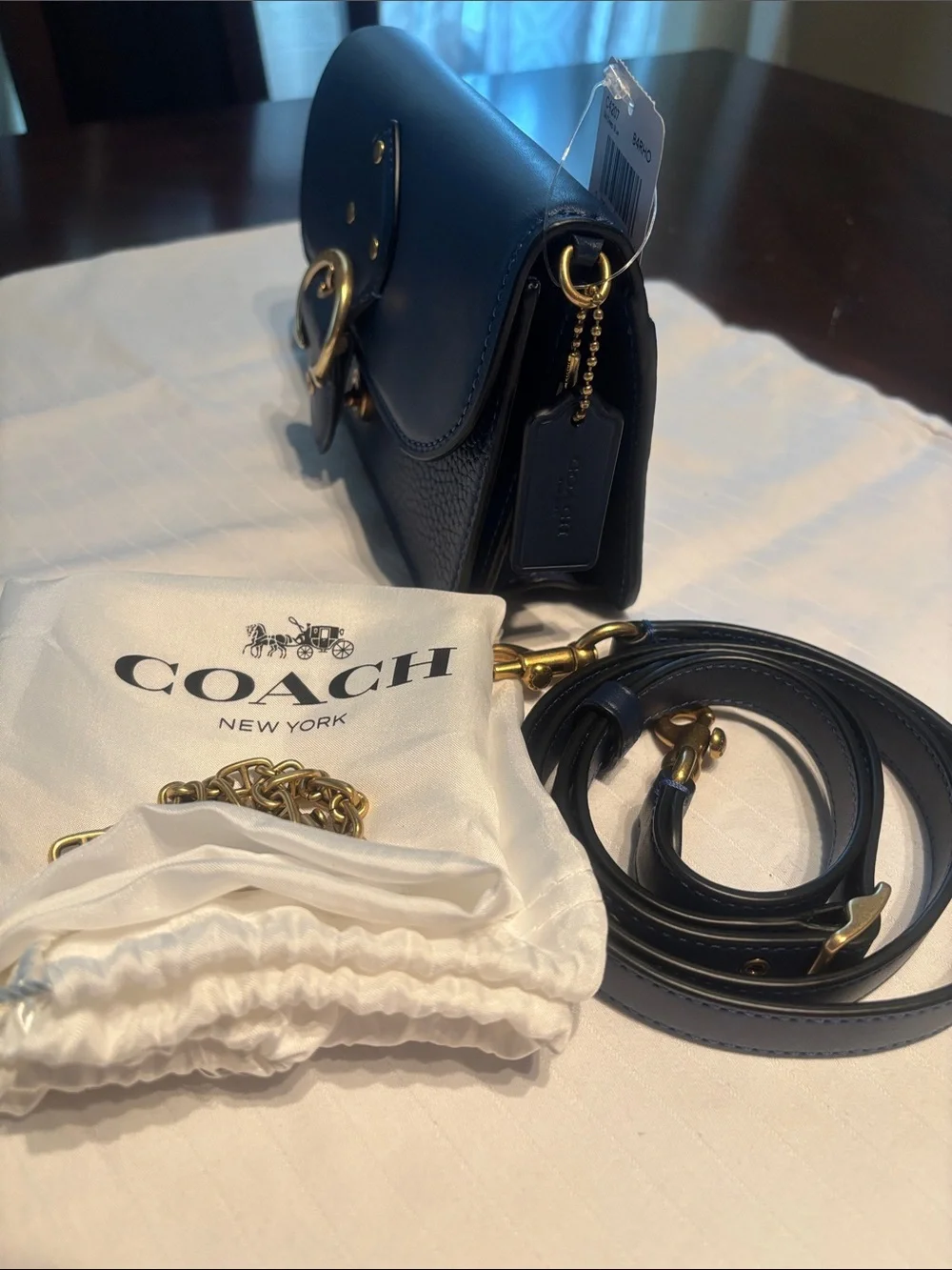 Coach sleek leather